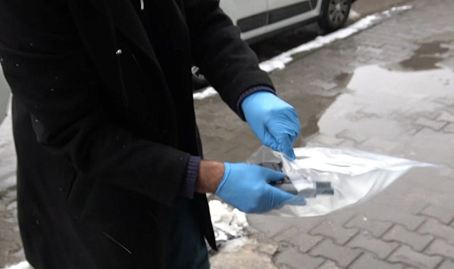 Tabancayı gizlerken önce güvenlik kameralarına sonra polise yakalandı
