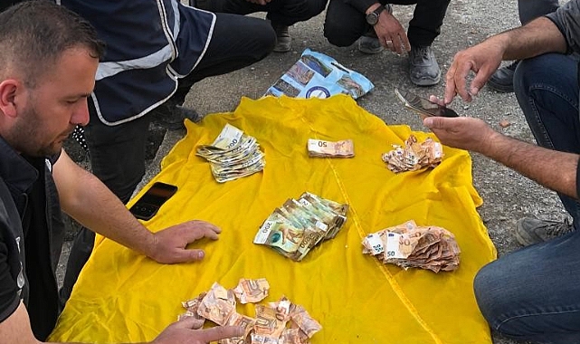 Çocuğunun eğitimi için biriktirdiği parasını polis teslim etti