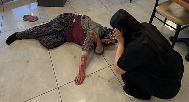 Tekmelere aldırmayan köpek kadının kolunu kopardı